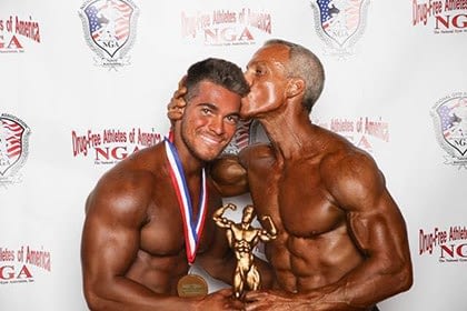 Zach & Oscar Muñoz holding the 1st place trophy.